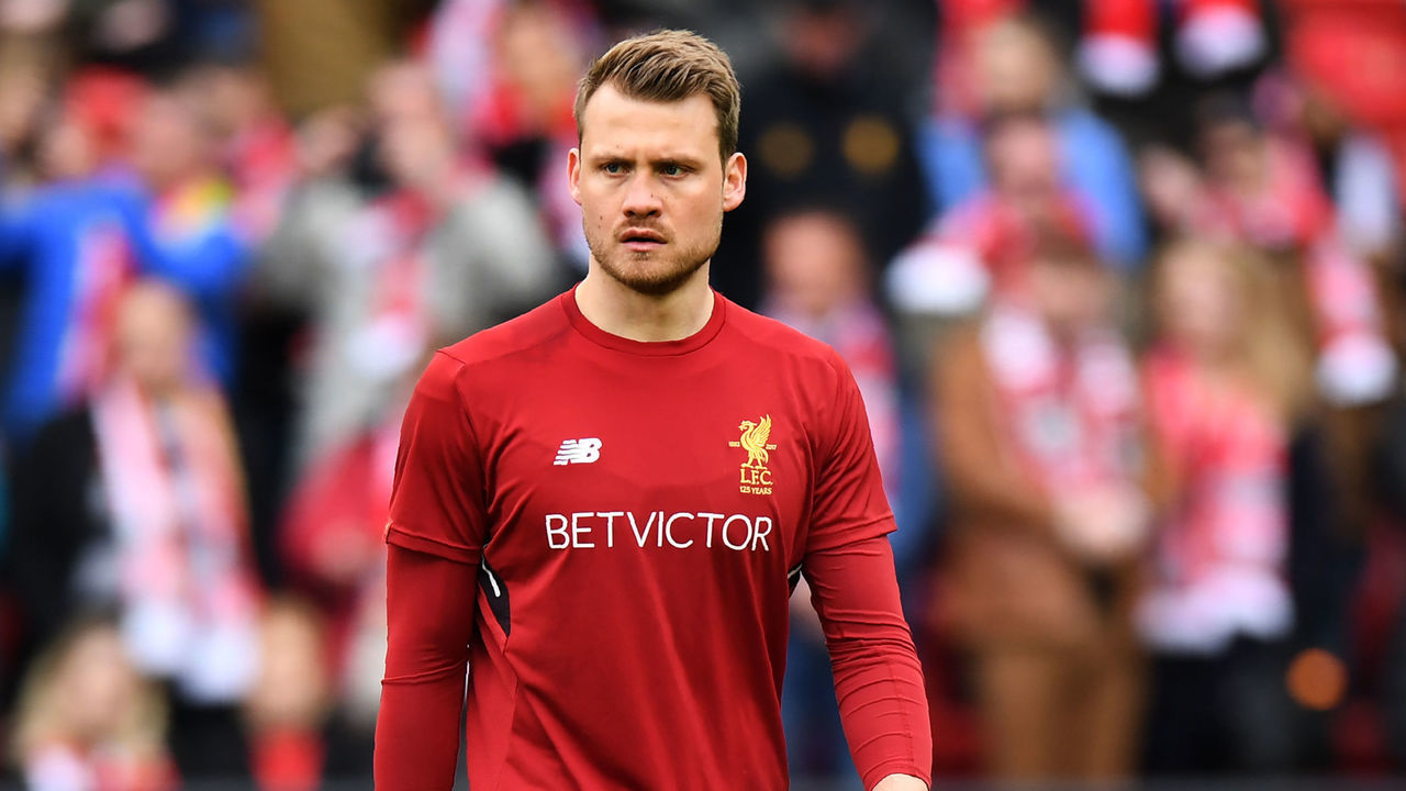 Liverpool's Belgian goalkeeper Simon Mignolet warms up before the English Premier League football match between Liverpool and Stoke City at Anfield in Liverpool, north west England on April 28, 2018.
