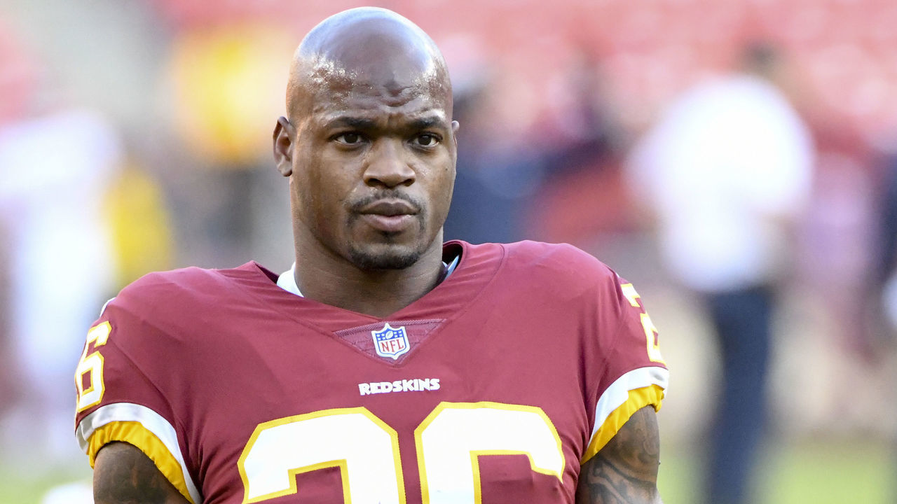 LANDOVER, MD - AUGUST 24: Washington Redskins running back Adrian Peterson (26) stretches prior to the game against the Denver Broncos on August 24, 2018, at FedEx Field in Landover, MD.