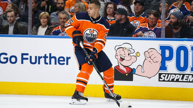 EDMONTON, AB - OCTOBER 09: Darnell Nurse #25 of the Edmonton Oilers skates after losing his helmet against the Winnipeg Jets at Rogers Place on October 9, 2017 in Edmonton, Canada.