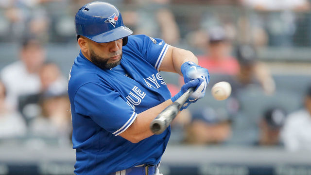 NEW YORK, NY - AUGUST 19: Kendrys Morales #8 of the Toronto Blue Jays hits a single in the first inning against the New York Yankees at Yankee Stadium on August 19, 2018 in the Bronx borough of New York City.