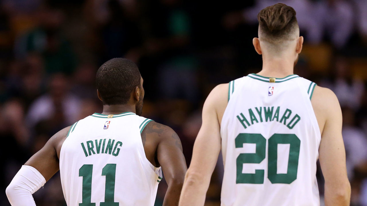 BOSTON, MA - OCTOBER 2: Kyrie Irving #11 of the Boston Celtics and Gordon Hayward #20 look on during the first half against the Charlotte Hornets at TD Garden on October 2, 2017 in Boston, Massachusetts.
