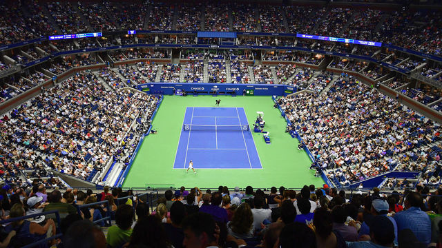 NEW YORK, NY - AUGUST 27: Serena Williams of the United States serves the ball during her women's singles first round match against Magda Linette of Poland on Day One of the 2018 US Open at the USTA Billie Jean King National Tennis Center on August 27, 2018 in the Flushing neighborhood of the Queens borough of New York City.