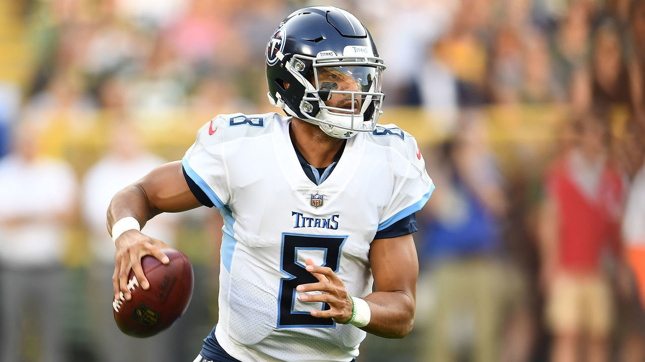 GREEN BAY, WI - AUGUST 09: Marcus Mariota #8 of the Tennessee Titans looks to pass during the first quarter of a preseason game against the Green Bay Packers at Lambeau Field on August 9, 2018 in Green Bay, Wisconsin.