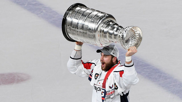 LAS VEGAS, NV - JUNE 07: Tom Wilson #43 of the Washington Capitals hoists the Stanley Cup after the team's 4-3 win over the Vegas Golden Knights in Game Five of the 2018 NHL Stanley Cup Final at T-Mobile Arena on June 7, 2018 in Las Vegas, Nevada.