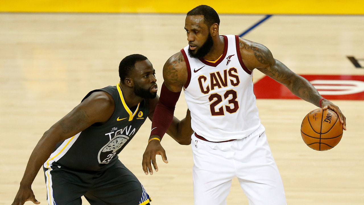 OAKLAND, CA - JUNE 03: LeBron James #23 of the Cleveland Cavaliers is defended by Draymond Green #23 of the Golden State Warriors in Game 2 of the 2018 NBA Finals at ORACLE Arena on June 3, 2018 in Oakland, California.
