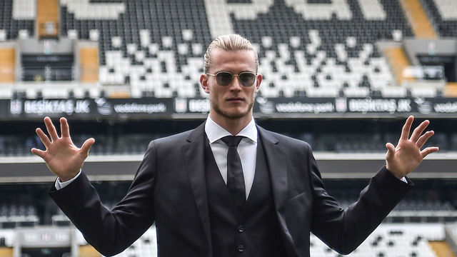 German goalkeeper Loris Karius poses on the football picth of the Vodafone Park Stadium, on August 29, 2018 after his presentation, in Istanbul. - Liverpool goalkeeper Loris Karius has joined Turkish football team Besiktas for a two-year loan deal.