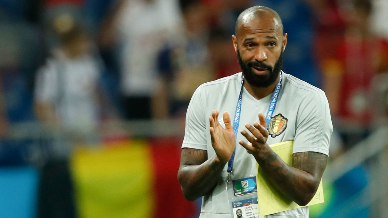 Belgium's assistant coach Thierry Henry applauds at the end of the Russia 2018 World Cup round of 16 football match between Belgium and Japan at the Rostov Arena in Rostov-On-Don on July 2, 2018. Belgium won 3-2.