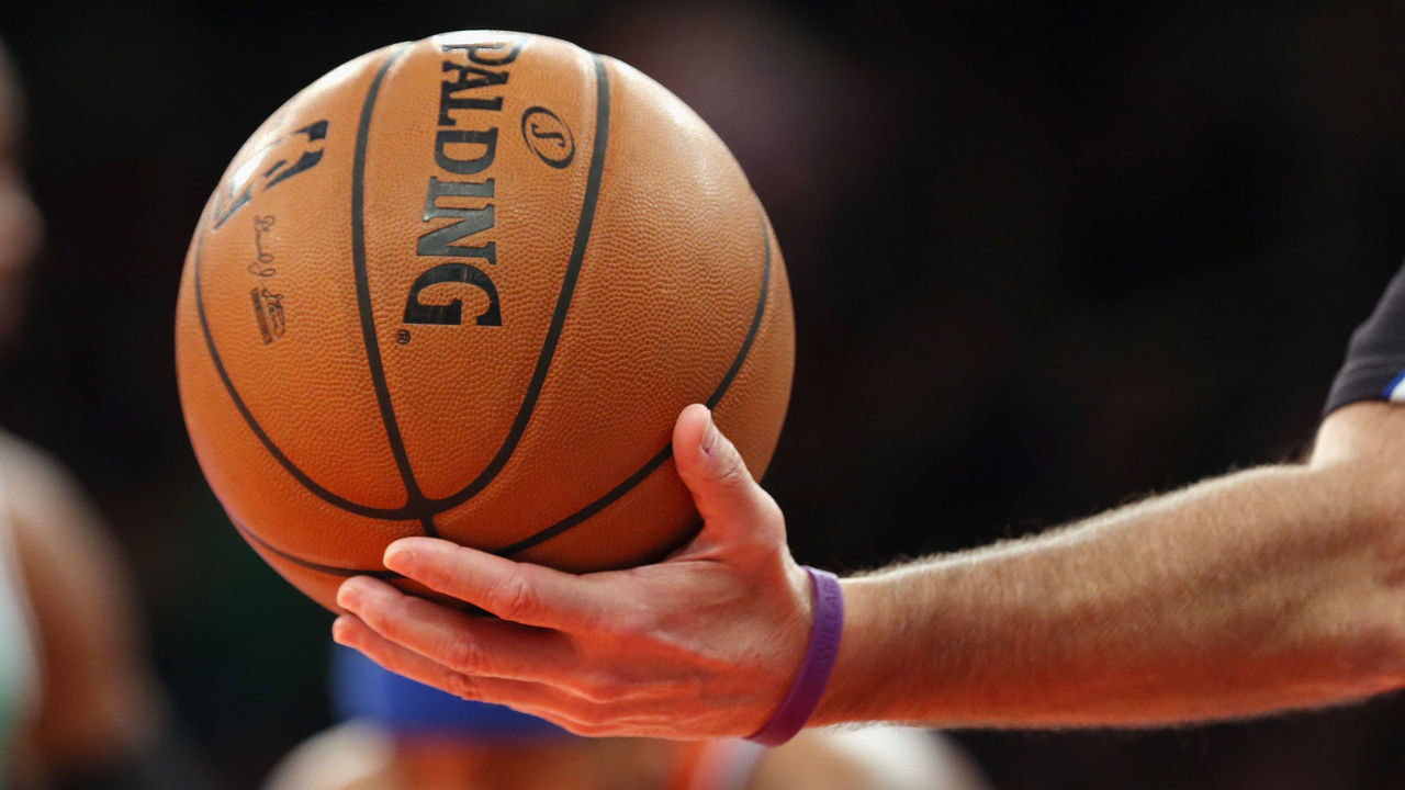 NEW YORK, NY - DECEMBER 08: A ref hands off the ball during the game between the New York Knicks and the Boston Celtics at Madison Square Garden on December 8, 2013 in New York City.