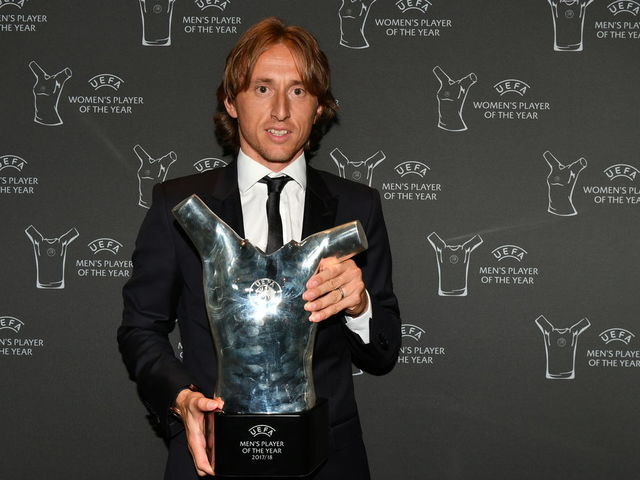MONACO, MONACO - AUGUST 30: UEFA Player of the Year Award winner Luka Modric with the award following the Champions League Group Stage draw part of the UEFA ECF Season Kick Off 2018/19 on August 30, 2018 in Monaco, Monaco.