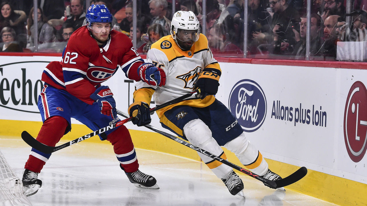 MONTREAL, QC - FEBRUARY 10: Artturi Lehkonen #62 of the Montreal Canadiens and P.K. Subban #76 of the Nashville Predators skate after the puck during the NHL game at the Bell Centre on February 10, 2018 in Montreal, Quebec, Canada.