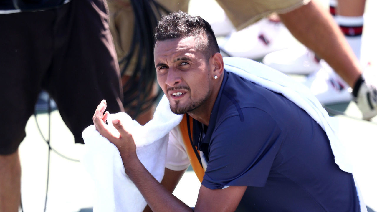 NEW YORK, NY - AUGUST 30: Nick Kyrgios of Australia takes a break during his men's singles second round match against Pierre-Hugues Herbert of France on Day Four of the 2018 US Open at the USTA Billie Jean King National Tennis Center on August 30, 2018 in the Flushing neighborhood of the Queens borough of New York City.