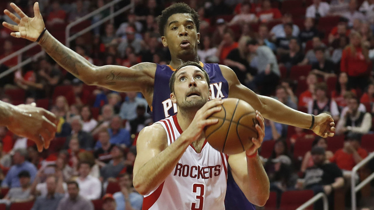 HOUSTON, TX - DECEMBER 26: Ryan Anderson #3 of the Houston Rockets goes up for a shot defended by Marquese Chriss #0 of the Phoenix Suns in the second half at Toyota Center on December 26, 2016 in Houston, Texas.