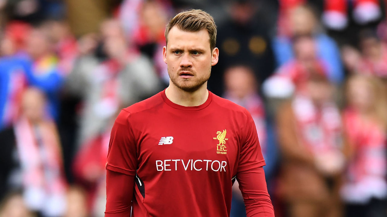 Liverpool's Belgian goalkeeper Simon Mignolet warms up before the English Premier League football match between Liverpool and Stoke City at Anfield in Liverpool, north west England on April 28, 2018.