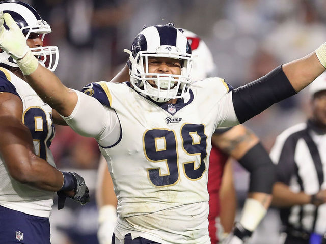 GLENDALE, AZ - DECEMBER 03: Defensive end Aaron Donald #99 of the Los Angeles Rams reacts after a tackle against the Arizona Cardinals during the second half of the NFL game at the University of Phoenix Stadium on December 3, 2017 in Glendale, Arizona. The Rams defeated the Cardinals 32-16.