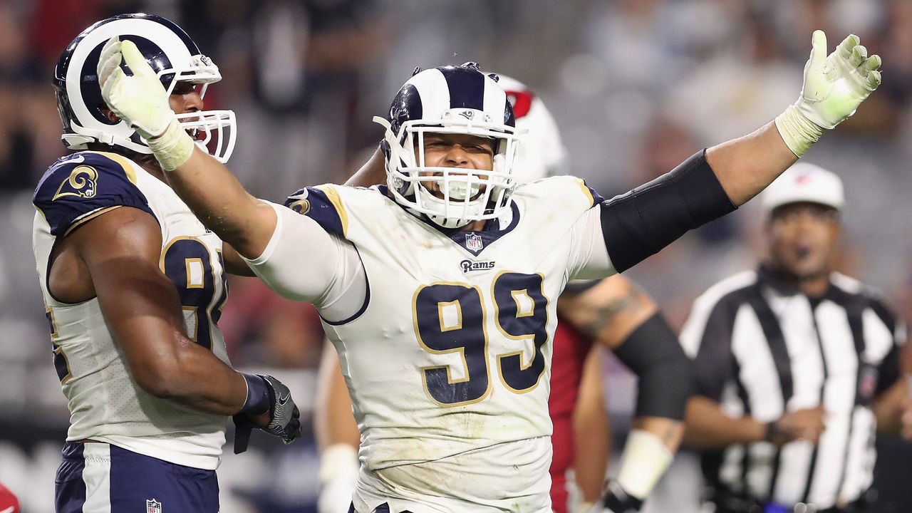 GLENDALE, AZ - DECEMBER 03: Defensive end Aaron Donald #99 of the Los Angeles Rams reacts after a tackle against the Arizona Cardinals during the second half of the NFL game at the University of Phoenix Stadium on December 3, 2017 in Glendale, Arizona. The Rams defeated the Cardinals 32-16.