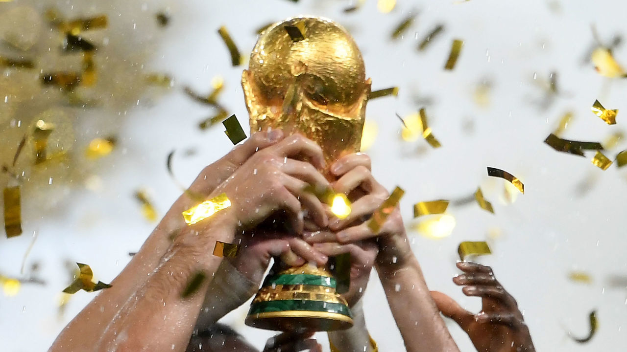 TOPSHOT - France's players lift the Fifa World Cup trophy after the Russia 2018 World Cup final football match between France and Croatia at the Luzhniki Stadium in Moscow on July 15, 2018. - France won the World Cup for the second time in their history after beating Croatia 4-2 in the final in Moscow's Luzhniki Stadium on Sunday.