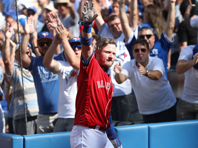 TORONTO, CANADA - AUGUST 28: Josh Donaldson #20 of the Toronto Blue Jays comes out of the dugout for a curtain call after hitting his home run of the game in the eighth inning during MLB game action against the Minnesota Twins on August 28, 2016 at Rogers Centre in Toronto, Ontario, Canada.