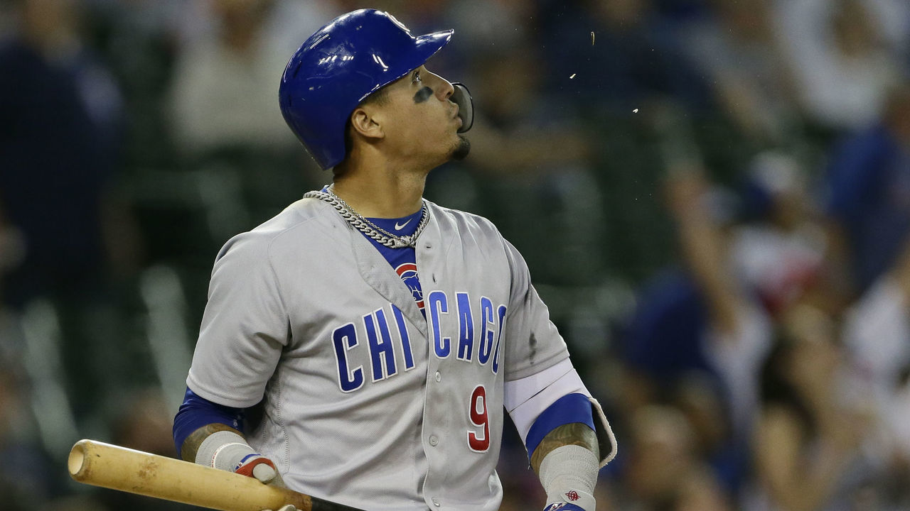 DETROIT, MI - AUGUST 22: Javier Baez #9 of the Chicago Cubs watches his three-run home run against the Detroit Tigers during the ninth inning at Comerica Park on August 22, 2018 in Detroit, Michigan.