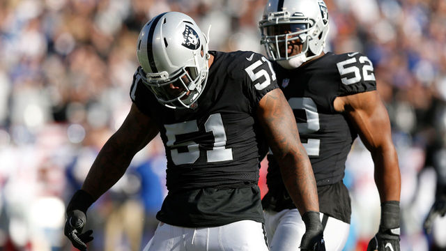 OAKLAND, CA - DECEMBER 03: Bruce Irvin #51 and Khalil Mack #52 of the Oakland Raiders celebrate after a play against the New York Giants during their NFL game at Oakland-Alameda County Coliseum on December 3, 2017 in Oakland, California.