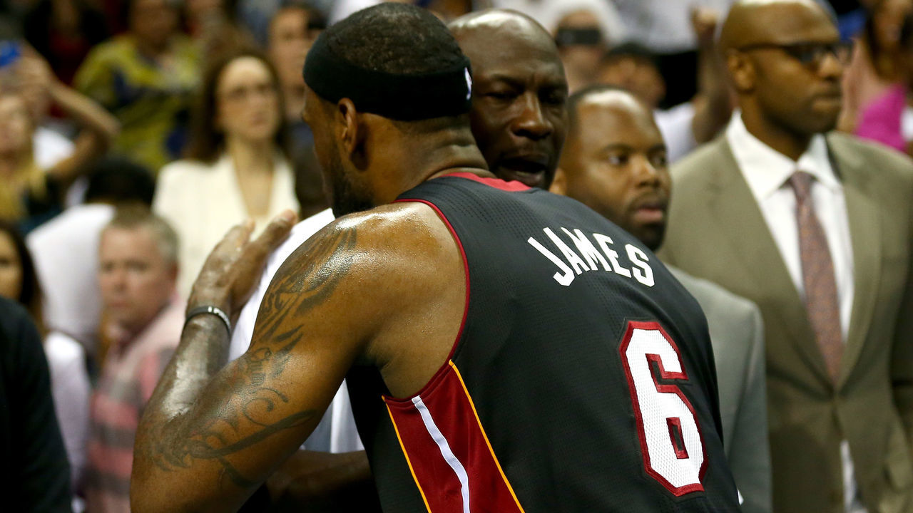 CHARLOTTE, NC - APRIL 28: LeBron James #6 of the Miami Heat hugs Michael Jordan after defeating the Charlotte Bobcats 109-98 in Game Four of the Eastern Conference Quarterfinals during the 2014 NBA Playoffs at Time Warner Cable Arena on April 28, 2014 in Charlotte, North Carolina.