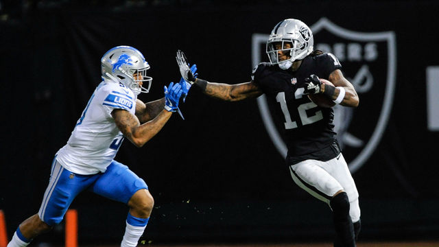OAKLAND, CA - AUGUST 10: Oakland Raiders wide receiver Martavis Bryant (12) tries to stiff arm a Detroit Lions player during the preseason football game between the Oakland Raiders and the Detroit Lions on August 10,2018 at Oakland-Alameda County Coliseum in Oakland,CA