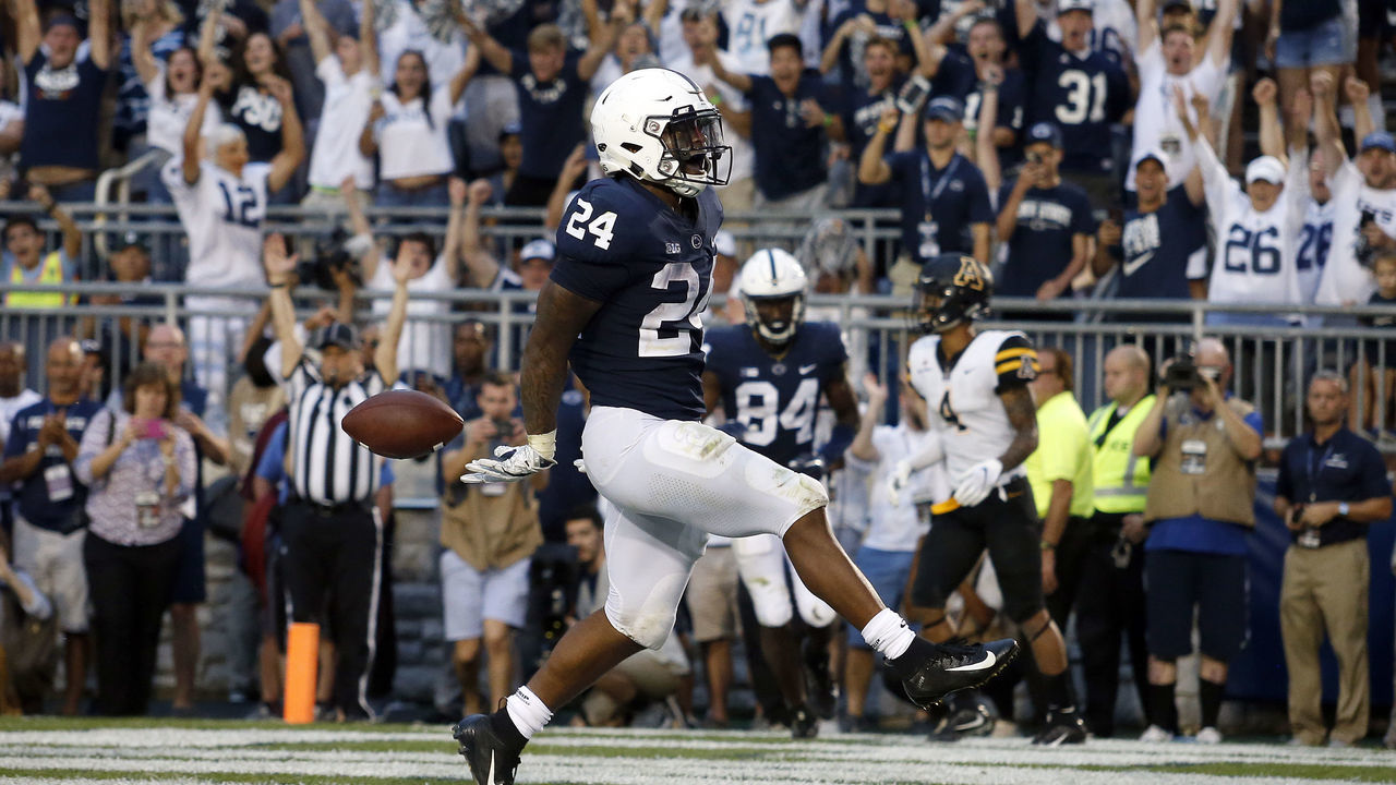 STATE COLLEGE, PA - SEPTEMBER 01: Miles Sanders #24 of the Penn State Nittany Lions rushes for a 4 yard touchdown in overtime against the Appalachian State Mountaineers on September 1, 2018 at Beaver Stadium in State College, Pennsylvania.