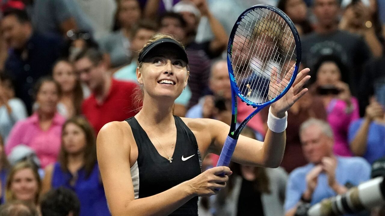 Russia's Maria Sharapova celebrates after defeating Latvia's Jelena Ostapenko during their 2018 US Open Women's Singles tennis match at the USTA Billie Jean King National Tennis Center in New York on September 1, 2018.