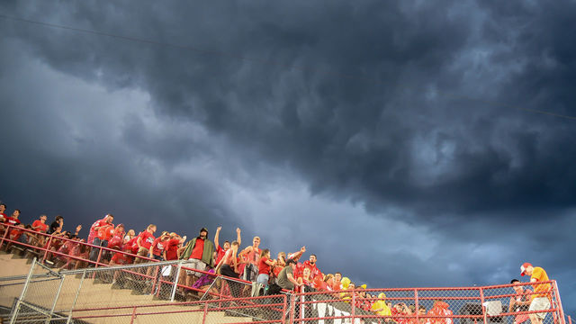 LINCOLN, NE - SEPTEMBER 01: Fans wait out a weather delay in the game between the Nebraska Cornhuskers and the Akron Zips at Memorial Stadium on September 1, 2018 in Lincoln, Nebraska.