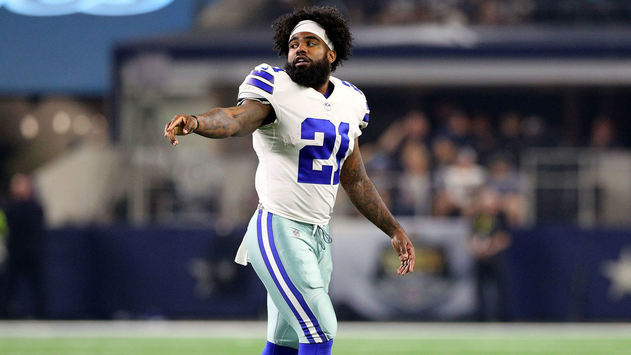 ARLINGTON, TX - AUGUST 26: Ezekiel Elliott #21 of the Dallas Cowboys walks back to the sideline during a time out against the Arizona Cardinals in the second quarter at AT&T Stadium on August 26, 2018 in Arlington, Texas.