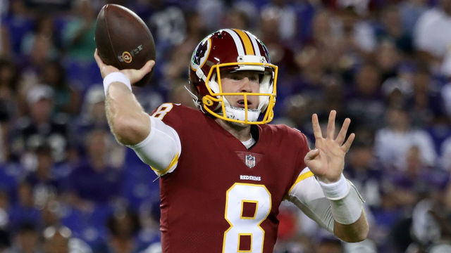 BALTIMORE, MD - AUGUST 30: Quarterback Kevin Hogan #8 of the Washington Redskins throws a pass against the Baltimore Ravens in the first half of a preseason game at M&T Bank Stadium on August 30, 2018 in Baltimore, Maryland.