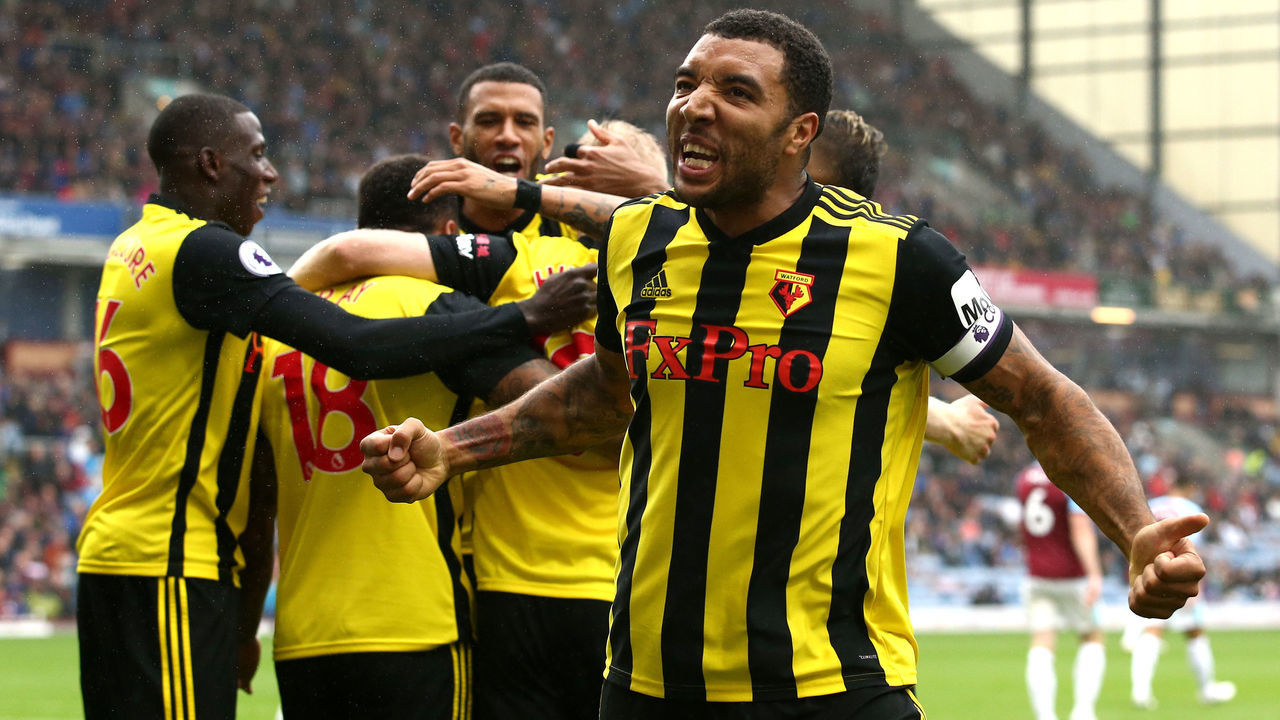 BURNLEY, ENGLAND - AUGUST 19: Troy Deeney of Watford celebrates with teammates after scoring his sides second goal during the Premier League match between Burnley FC and Watford FC at Turf Moor on August 19, 2018 in Burnley, United Kingdom.