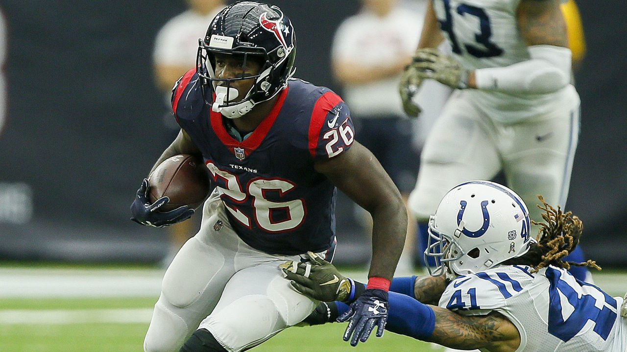 HOUSTON, TX - NOVEMBER 05: Lamar Miller #26 of the Houston Texans rushes past Matthias Farley #41 of the Indianapolis Colts at NRG Stadium on November 5, 2017 in Houston, Texas.