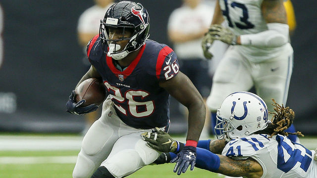 HOUSTON, TX - NOVEMBER 05: Lamar Miller #26 of the Houston Texans rushes past Matthias Farley #41 of the Indianapolis Colts at NRG Stadium on November 5, 2017 in Houston, Texas.