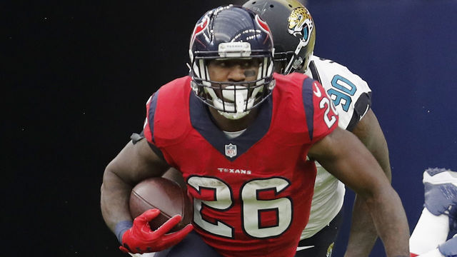 HOUSTON, TX - DECEMBER 18: Lamar Miller #26 of the Houston Texans carries the ball in the third quarter against the Jacksonville Jaguars at NRG Stadium on December 18, 2016 in Houston, Texas.