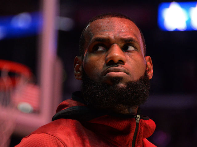 LOS ANGELES, CA - MARCH 11: LeBron James #23 of the Cleveland Cavaliers looks on during the national anthem before the game against the Los Angeles Lakers on March 11, 2018 at STAPLES Center in Los Angeles, California. NOTE TO USER: User expressly acknowledges and agrees that, by downloading and/or using this Photograph, user is consenting to the terms and conditions of the Getty Images License Agreement. Mandatory Copyright Notice: Copyright 2018 NBAE