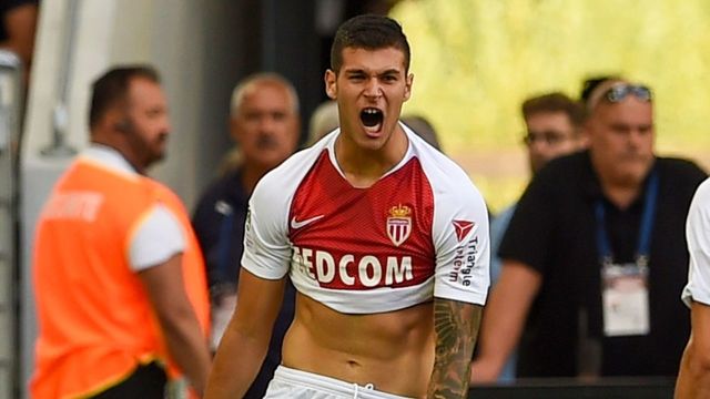 Monaco's Italian forward Pietro Pellegri (L) celebrates after scoring a goal during the French L1 football match between Bordeaux and Monaco on August 26, 2018 at the Matmut Atlantique stadium in Bordeaux, southwestern France.