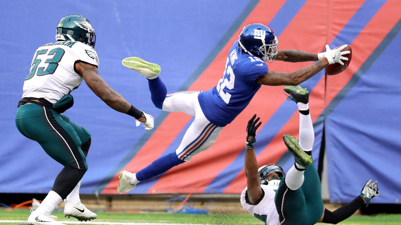 EAST RUTHERFORD, NJ - DECEMBER 17: Tavarres King #12 of the New York Giants dives for the endzone in the third quarter against the Philadelphia Eagles during their game at MetLife Stadium on December 17, 2017 in East Rutherford, New Jersey.