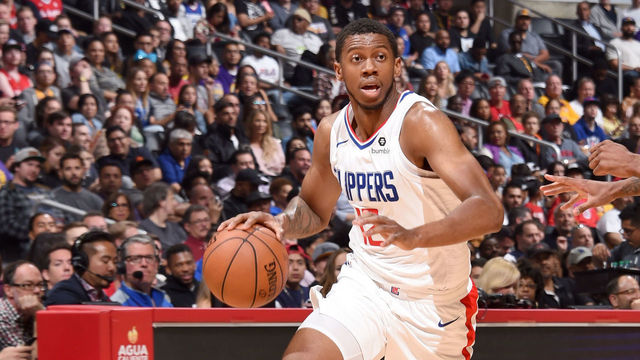 LOS ANGELES, CA - APRIL 11: Tyrone Wallace #12 of the LA Clippers handles the ball against the Los Angeles Lakers on April 11, 2018 at STAPLES Center in Los Angeles, California. NOTE TO USER: User expressly acknowledges and agrees that, by downloading and/or using this photograph, user is consenting to the terms and conditions of the Getty Images License Agreement. Mandatory Copyright Notice: Copyright 2018 NBAE