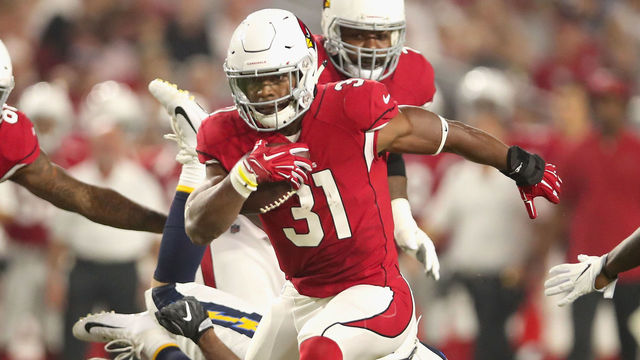 GLENDALE, AZ - AUGUST 11: Running back David Johnson #31 of the Arizona Cardinals rushes the football against the Los Angeles Chargers during the first half of the preseason NFL game at University of Phoenix Stadium on August 11, 2018 in Glendale, Arizona.