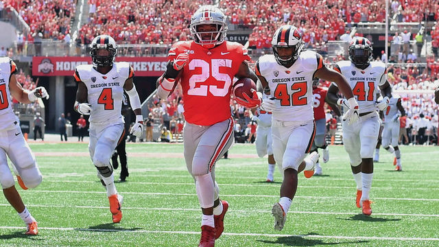 COLUMBUS, OH - SEPTEMBER 1: Mike Weber #25 of the Ohio State Buckeyes scores a touchdown on a 49-yard run in the second quarter against the Oregon State Beavers at Ohio Stadium on September 1, 2018 in Columbus, Ohio.