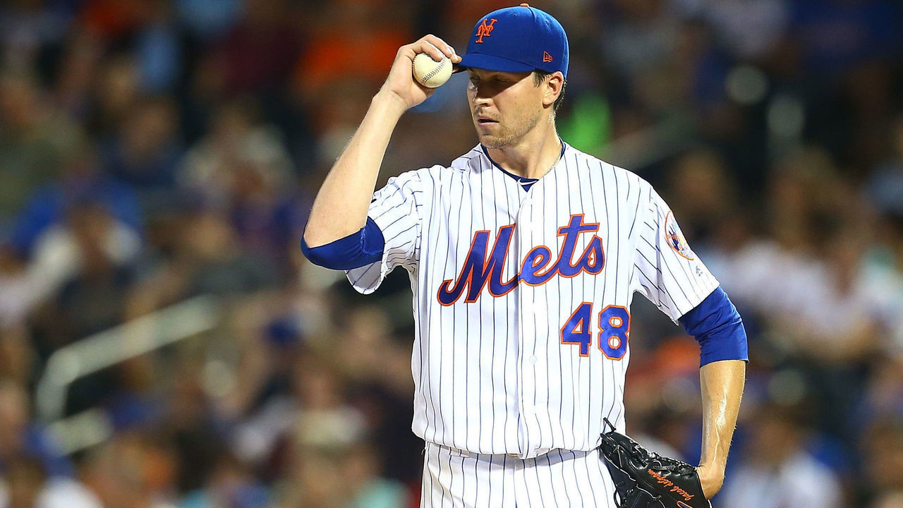 NEW YORK, NY - AUGUST 03: Jacob deGrom #48 of the New York Mets looks on in the fifth inning against the Atlanta Braves at Citi Field on August 3, 2018 in the Flushing neighborhood of the Queens borough of New York City.
