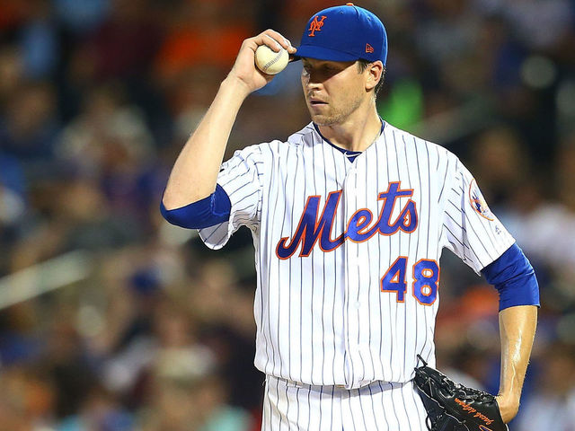 NEW YORK, NY - AUGUST 03: Jacob deGrom #48 of the New York Mets looks on in the fifth inning against the Atlanta Braves at Citi Field on August 3, 2018 in the Flushing neighborhood of the Queens borough of New York City.