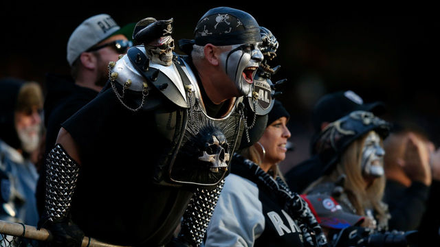OAKLAND, CA - DECEMBER 03: A Oakland Raiders fan cheers in the stands during their NFL game against the New York Giants at Oakland-Alameda County Coliseum on December 3, 2017 in Oakland, California.