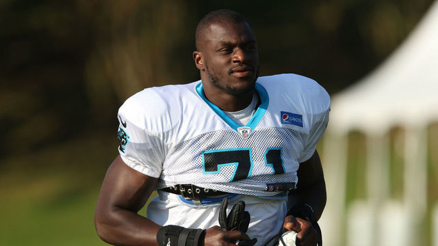 SPARTANBURG, SC - JULY 28: Efe Obada (71) defensive end Carolina Panthers jogs to the field for the third day of the Carolina Panthers training camp practice at Wofford College July 28, 2018 in Spartanburg, S.C.