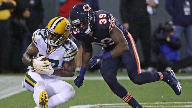 GREEN BAY, WI - SEPTEMBER 28: Davante Adams #17 of the Green Bay Packers catches a touchdown pass behind Eddie Jackson #39 of the Chicago Bears at Lambeau Field on September 28, 2017 in Green Bay, Wisconsin. The Packers defeated the Bears 35-14.