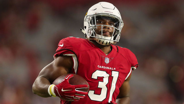 GLENDALE, AZ - AUGUST 11: Running back David Johnson #31 of the Arizona Cardinals warms up before the preseason NFL game against the Los Angeles Chargers at University of Phoenix Stadium on August 11, 2018 in Glendale, Arizona.