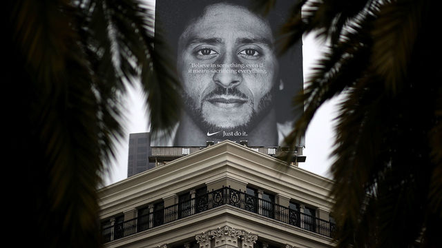SAN FRANCISCO, CA - SEPTEMBER 05: A billboard featuring former San Francisco 49ers quaterback Colin Kaepernick is displayed on the roof of the Nike Store on September 5, 2018 in San Francisco, California. Nike launched an ad campaign to commemorate the 30th anniversary of its iconic 'Just Do It' motto that features controversial former NFL quarterback Colin Kaepernick and a message that says 'Believe in something. Even if it means sacrificing everything.'