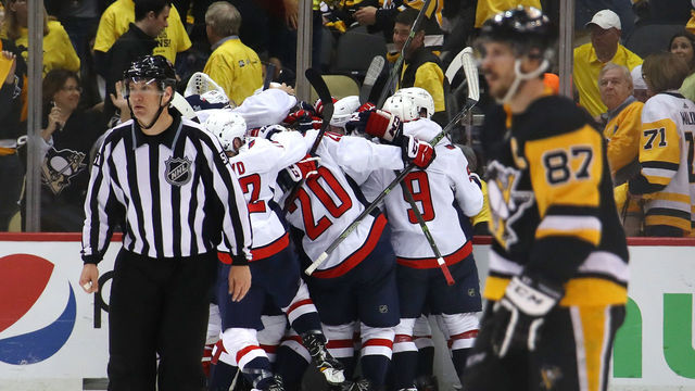 PITTSBURGH, PA - MAY 07: The Washington Capitals celebrate moving on to the Eastern Conference Finals after a 2-1 overtime win behind Sidney Crosby #87 of the Pittsburgh Penguins in Game Six of the Eastern Conference Second Round during the 2018 NHL Stanley Cup Playoffs at PPG Paints Arena on May 7, 2018 in Pittsburgh, Pennsylvania.