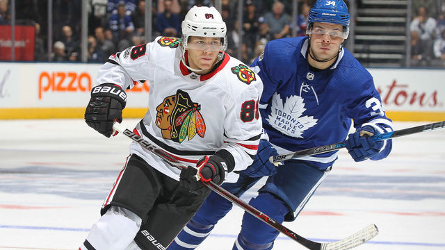 TORONTO, ON - OCTOBER 9: Patrick Kane #88 of the Chicago Blackhawks is shadowed by Auston Matthews #34 of the Toronto Maple Leafs in an NHL game at the Air Canada Centre on October 9, 2017 in Toronto, Ontario.