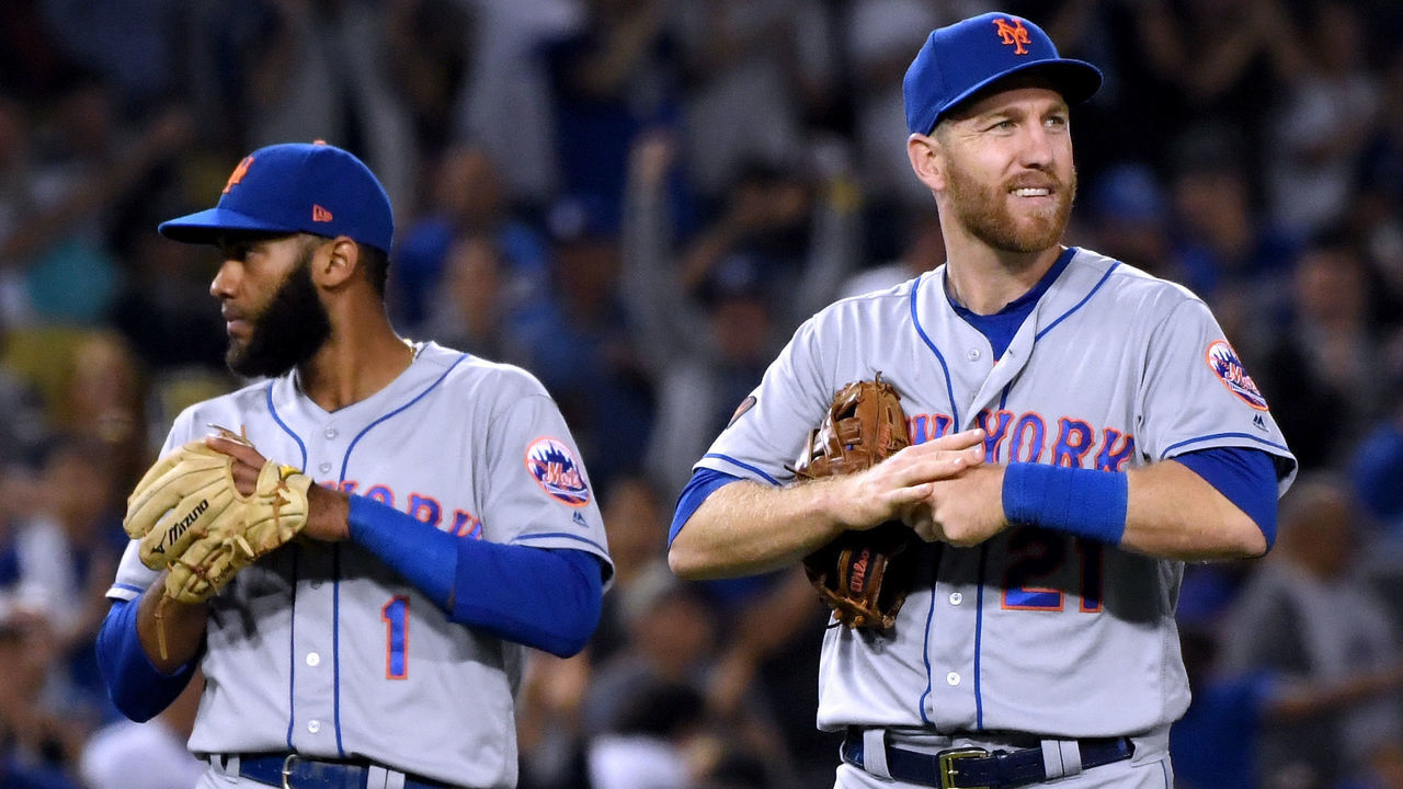 LOS ANGELES, CA - SEPTEMBER 04: Todd Frazier #21 of the New York Mets reacts to his fileding errorin front of Amed Rosario #1, allowing Enrique Hernandez #14 to score, to tie the game 4-4 during the fourth inning at Dodger Stadium on September 4, 2018 in Los Angeles, California.